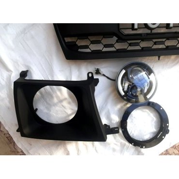 Toyota Land Cruiser LC100 2003+ оптика передняя Full LED + решетка радиатора стиль 3D